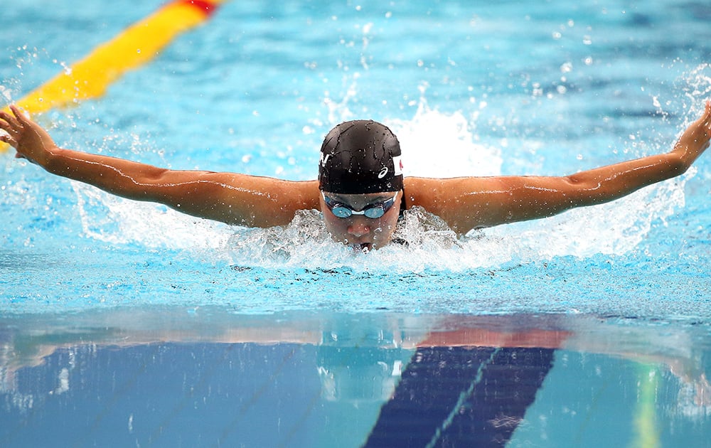 Japan's Miho Takahashi swims in her women's 400m individual medley heat at the 17th Asian Games in Incheon, South Korea.