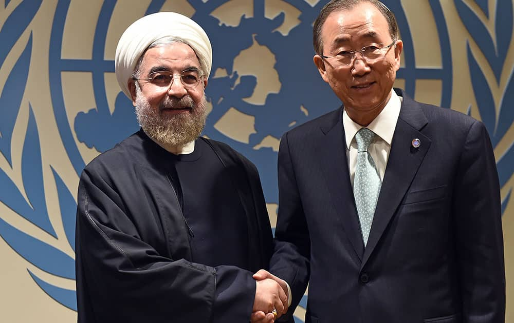 UN Secretary-General Ban Ki-moon, right, greets Iranian President Hassan Rouhani before a meeting at the United Nations  on the sidelines of the 69th Session of the UN General Assembly.