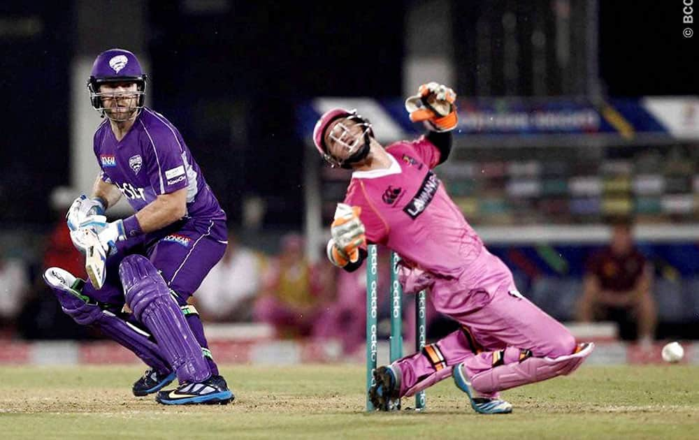 Aiden Blizzard of Hobart Hurricanes and BJ Watling of the Northern Knights during the Champions League Twenty20 match at the Chhattisgarh International Cricket Stadium in Raipur.