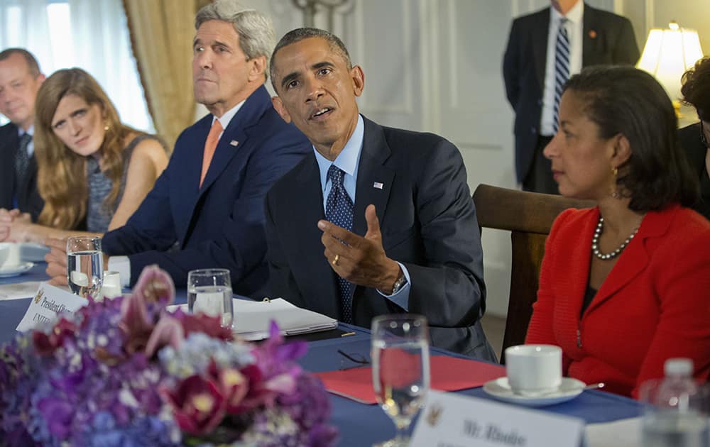 President Barack Obama, flanked by Secretary of State John Kerry and National Security Adviser Susan Rice, speaks during his meeting with the representatives of Bahrain, Qatar, Saudi Arabia, Jordan, United Arab Emirates and Iraq in New York.