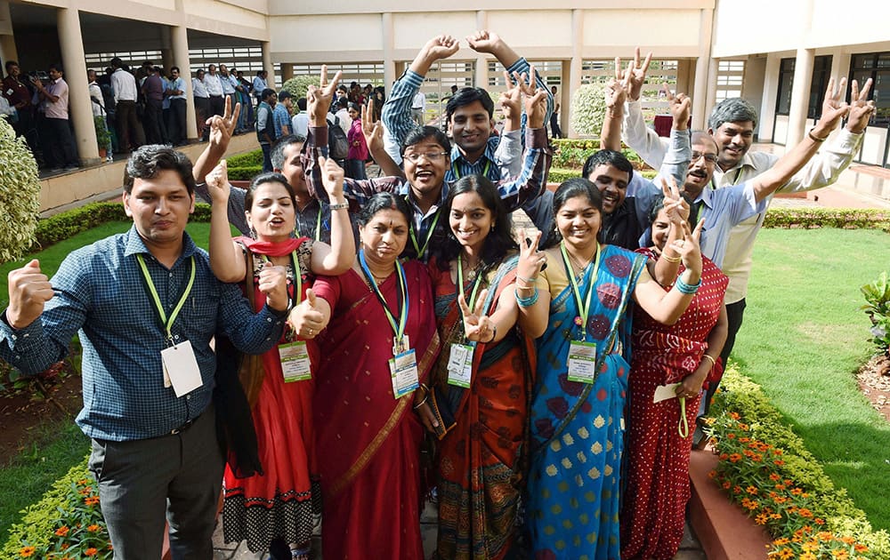 ISRO scientists and other officials celebrate the success of Mars Orbiter Mission at MARS Orbiter Command Network complex.