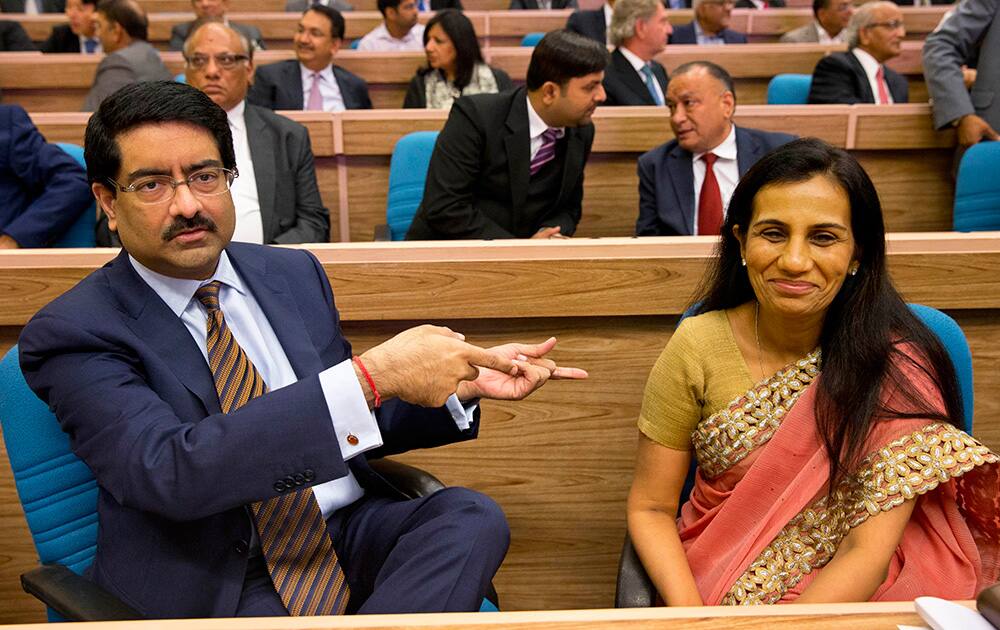 Aditya Birla Group Chairman Kumar Mangalam Birla, left and ICICI Bank, CEO Chanda Kochhar gesture during the launch of 'Make in India' initiative in New Delhi.