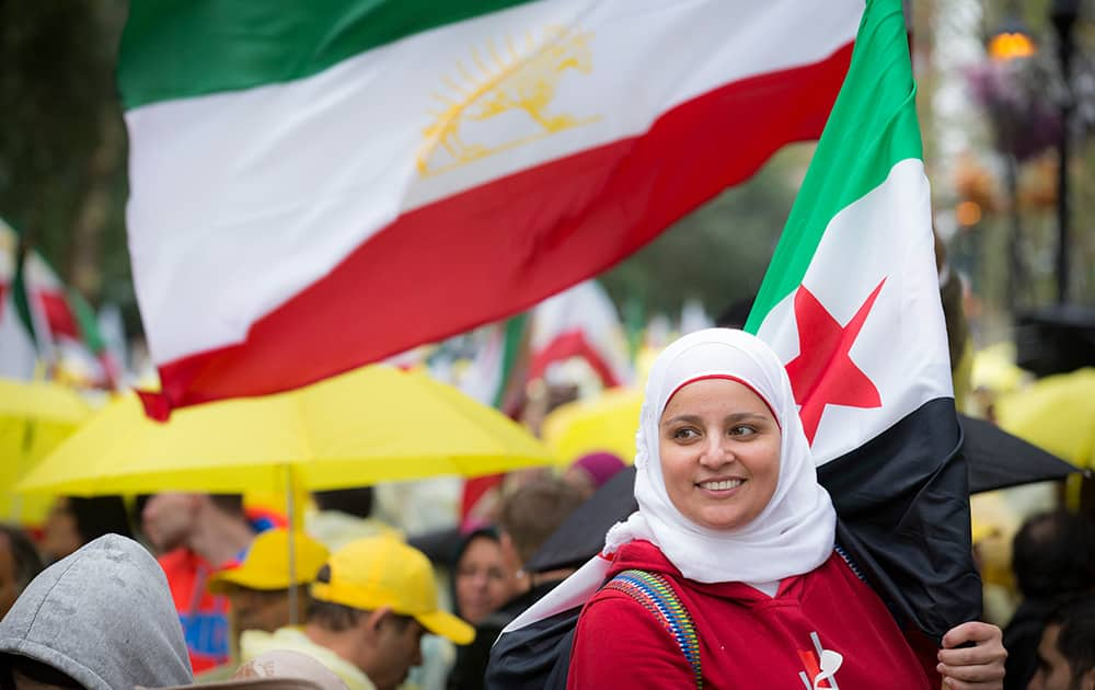 Protestors demonstrate against the government of Iran outside United Nations headquarters as the 69th session of the UN General Assembly convenes, in New York.