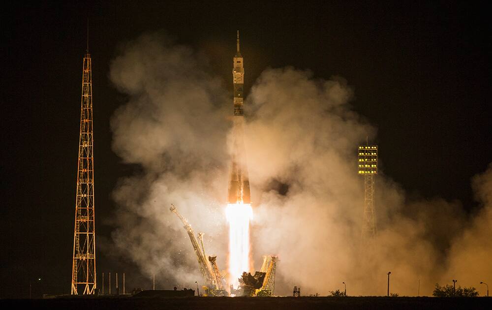 The Soyuz-FG rocket booster with Soyuz TMA-14M space ship carrying a new crew to the International Space Station, ISS, blasts off at the Russian leased Baikonur cosmodrome in Kazakhstan.