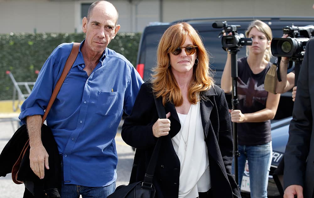 Actor Miguel Ferrer and his wife Lori Weintraub, arrive at Venice's airport. Actor director George Clooney revealed earlier this month at a star-studded benefit in Florence that he would marry human rights lawyer Amal Alamuddin in the lagoon city, but refrained from giving the date.