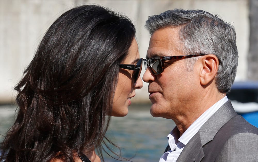 George Clooney and Amal Alamuddin arrive in Venice, Italy. Clooney, 53, and Alamuddin, 36, are expected to get married this weekend in Venice, one of the world’s most romantic settings. 