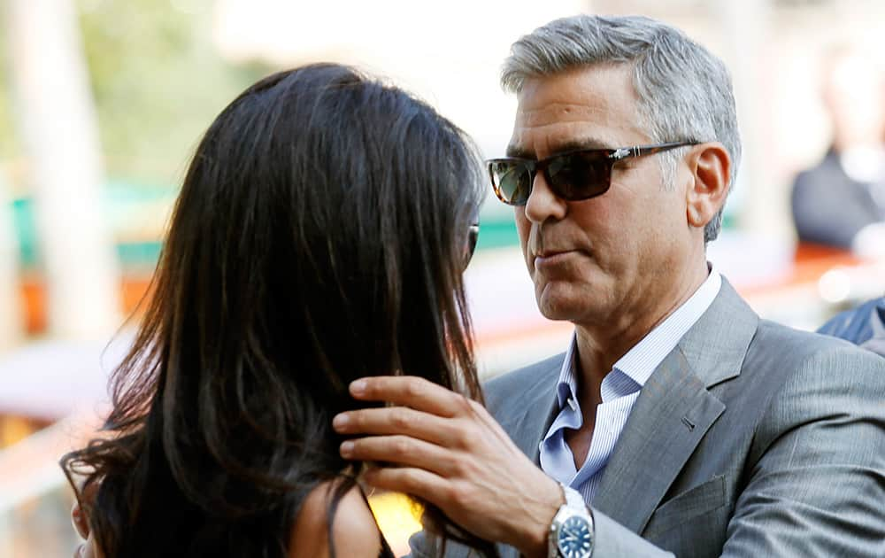 George Clooney and Amal Alamuddin arrive in Venice, Italy. Clooney, 53, and Alamuddin, 36, are expected to get married this weekend in Venice, one of the world’s most romantic settings. 