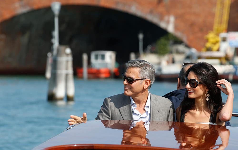 George Clooney and Amal Alamuddin arrive in Venice, Italy. Clooney, 53, and Alamuddin, 36, are expected to get married this weekend in Venice, one of the world’s most romantic settings. 