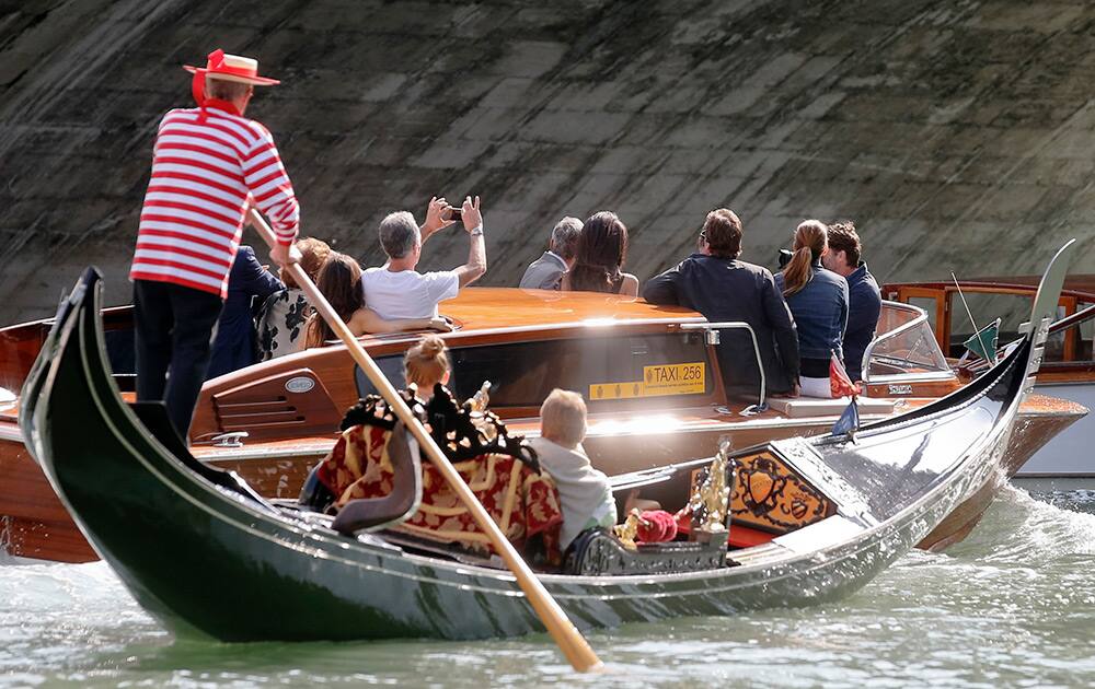 George Clooney and Amal Alamuddin arrive in Venice, Italy. Clooney, 53, and Alamuddin, 36, are expected to get married this weekend in Venice, one of the world’s most romantic settings. 