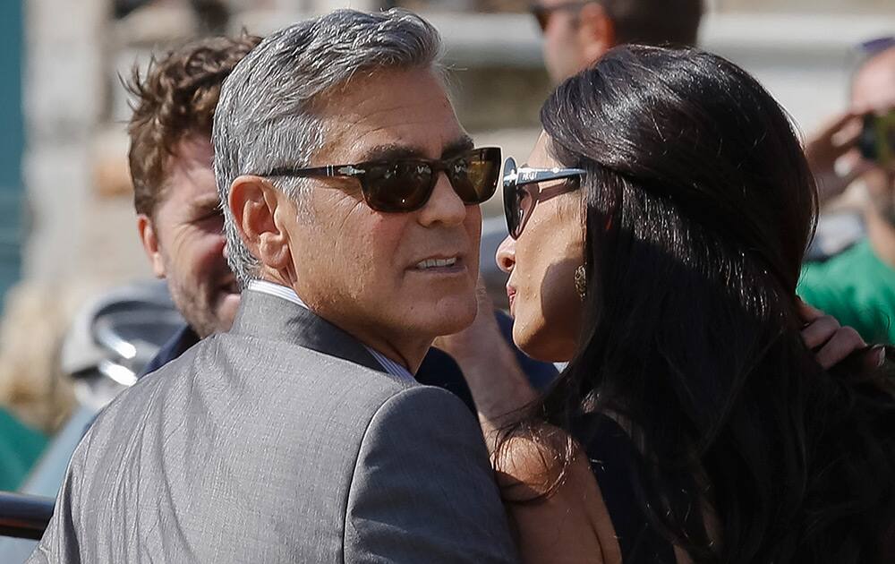 George Clooney and Amal Alamuddin arrive in Venice, Italy. Clooney, 53, and Alamuddin, 36, are expected to get married this weekend in Venice, one of the world’s most romantic settings. 