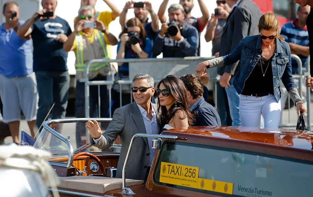 George Clooney and Amal Alamuddin arrive in Venice, Italy. Clooney, 53, and Alamuddin, 36, are expected to get married this weekend in Venice, one of the world’s most romantic settings. 