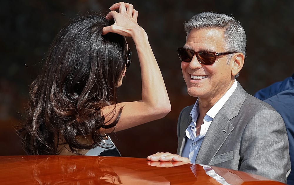 George Clooney and Amal Alamuddin arrive in Venice, Italy. Clooney, 53, and Alamuddin, 36, are expected to get married this weekend in Venice, one of the world’s most romantic settings. 