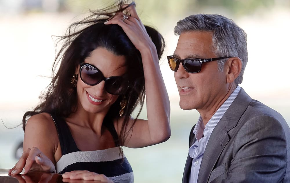 George Clooney and Amal Alamuddin arrive in Venice, Italy. Clooney, 53, and Alamuddin, 36, are expected to get married this weekend in Venice, one of the world’s most romantic settings. 