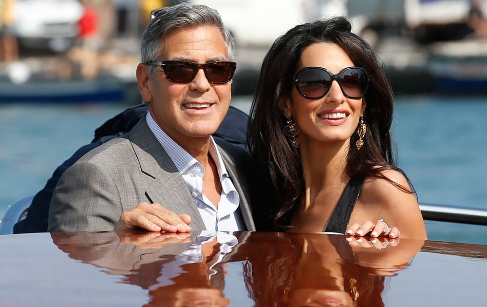 George Clooney and Amal Alamuddin arrive in Venice, Italy. Clooney, 53, and Alamuddin, 36, are expected to get married this weekend in Venice, one of the world’s most romantic settings. 