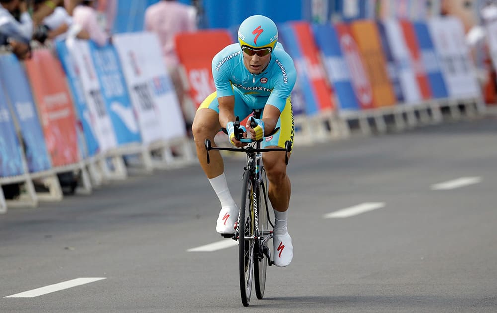 Gold medalist Kazakhstan's Alexey Lutsenko crossed the finish line in the men's cycling road individual time trial at the 17th Asian Games in Incheon, South Korea.