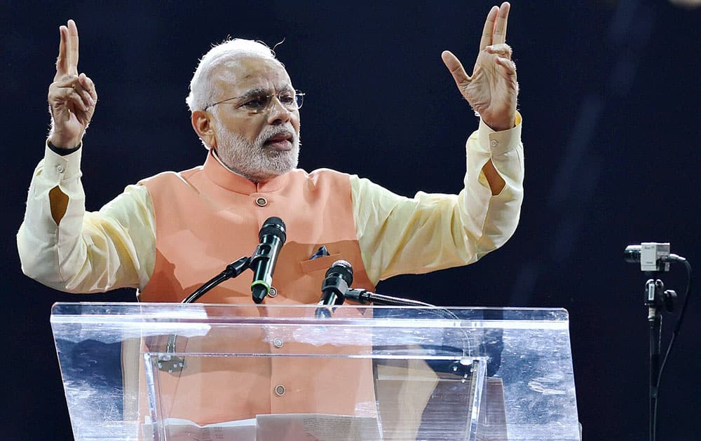 Prime Minister Narendra Modi gestures while addressing the audience during a reception organised in his honour by the Indian American Community Foundation at Madison Square Garden in New York.
