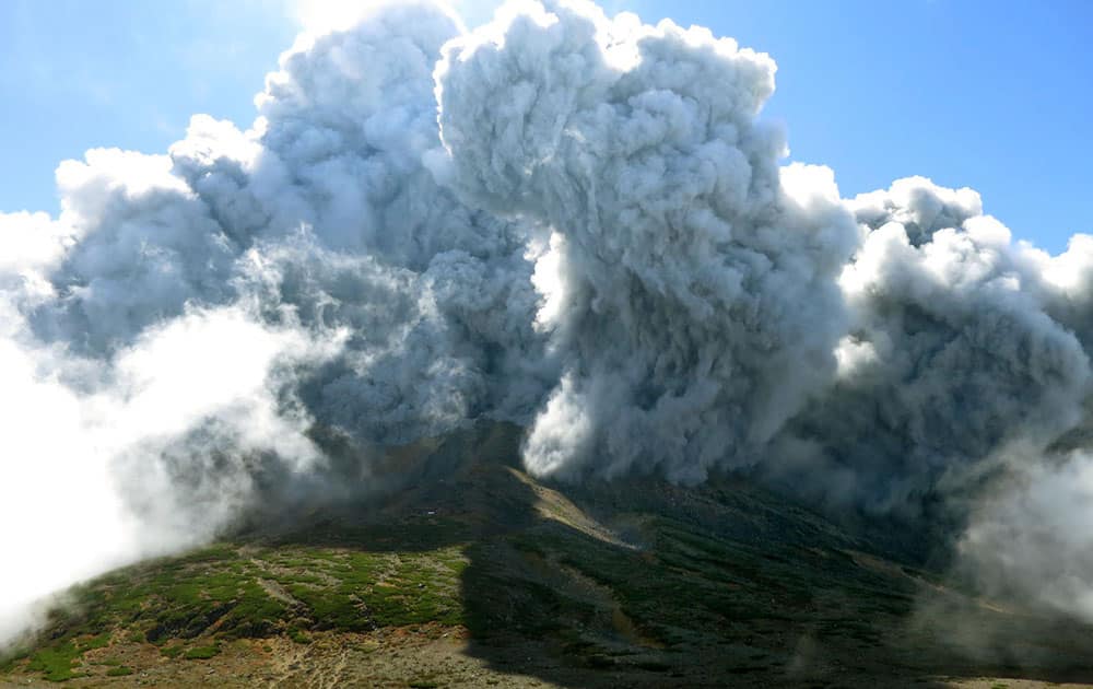 In this photo taken by an anonymous climber and was offered to Kyodo News, dense plumes rise from the summit crater of Mt. Ontake shortly after the volcanic mountain erupts in central Japan.