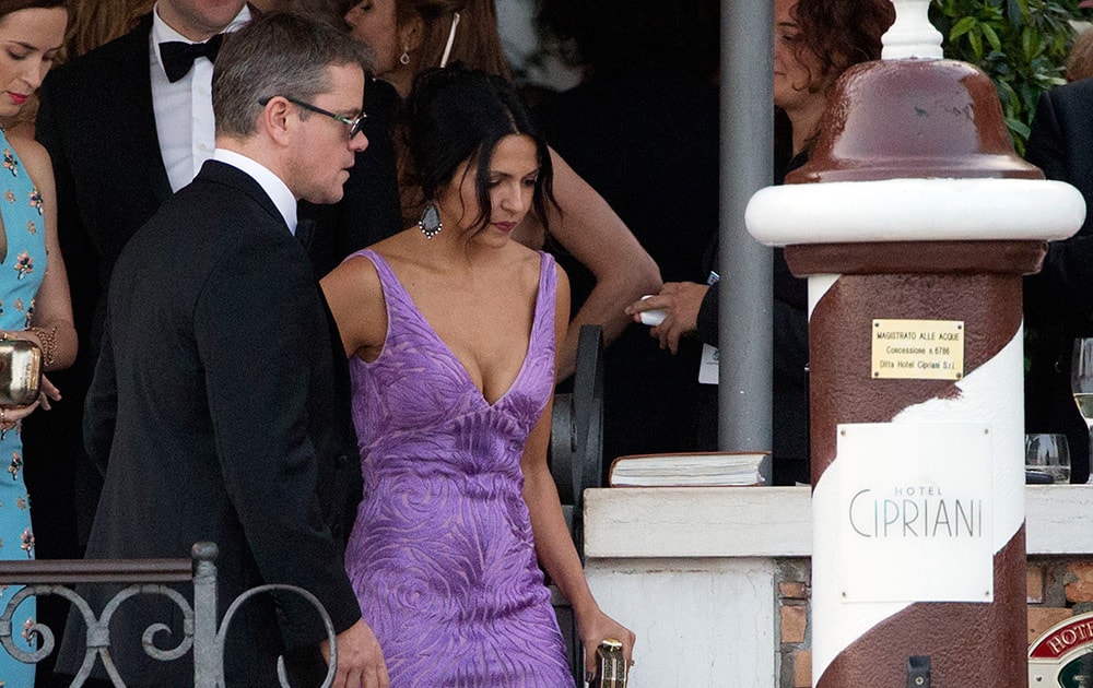 Actor Matt Damon and his wife Luciana Barroso leave the Cipriani hotel to go to the George Clooney wedding with Amal Alamuddin, in Venice, Italy.