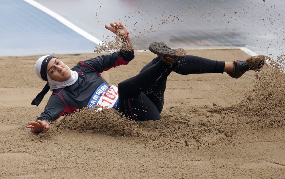 Iran's Sepideh Tavakoly Nik competes in the long jump of the women's heptathlon at the 17th Asian Games in Incheon, South Korea.