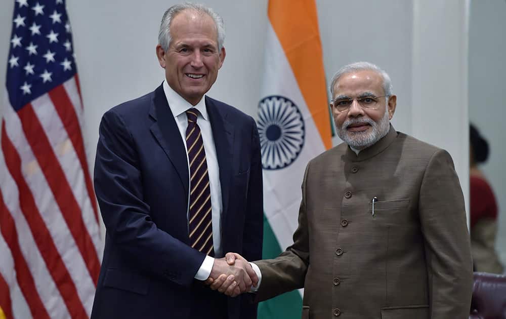 Prime Minister Narendra Modi shakes hands with James McNerney, CEO of Boeing during a meeting in New York, US.