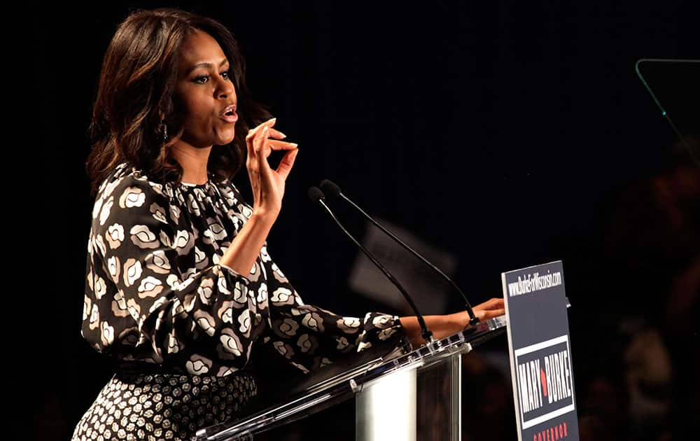 First lady Michelle Obama speaks on behalf of Wisconsin Democratic gubernatorial candidate Mary Burke at a campaign rally in Milwaukee. 