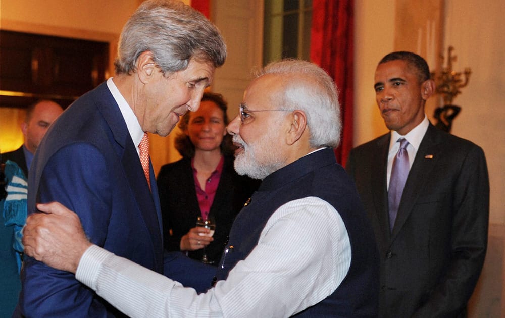 Prime Minister Narendra Modi meets the US Secretary of State, John Kerry, at the private dinner hosted by the President Barack Obama of the United States, in his honour, at the White House, in Washington DC.