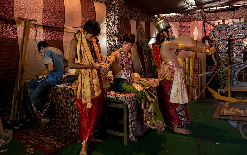 Actors dress up for 'Ramlila', a theater performance depicting the Hindu epic Ramayana as part of Dussehra festival celebrations in New Delhi.