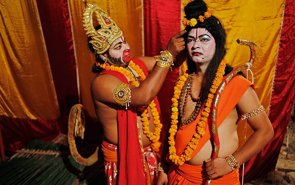 Artists prepare themselves before going on stage for a traditional Ramleela drama, narrating the life of Hindu God Rama, to celebrate the festival of Dussehra in Allahabad.