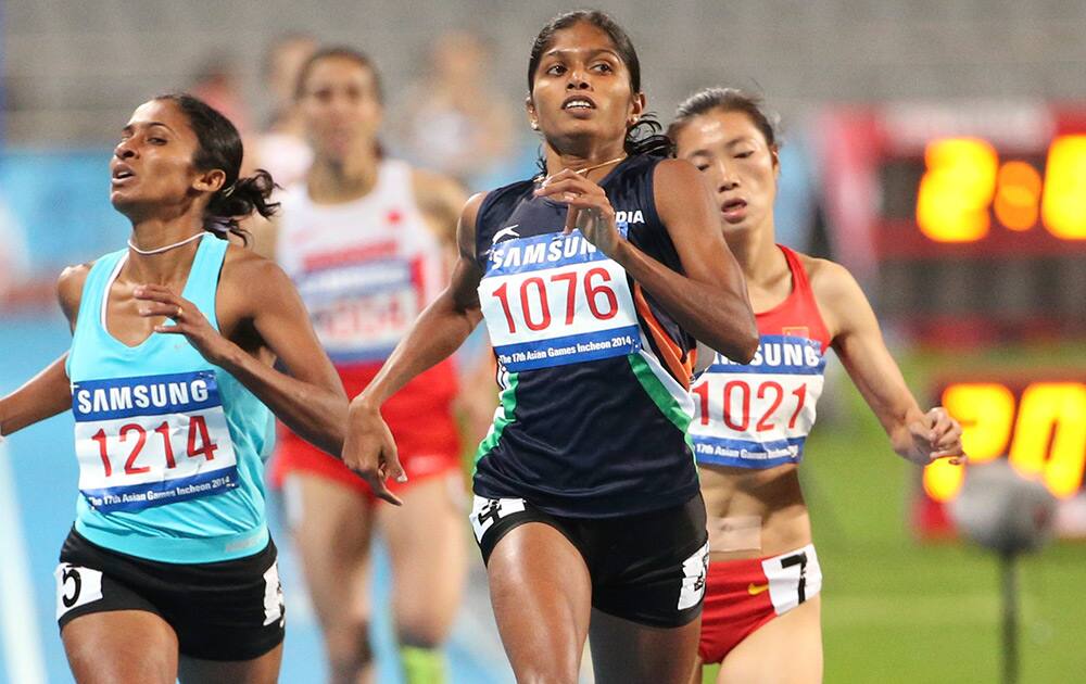 India’s Tintu Lukka leads in the women’s 800m heats at the 17th Asian Games in Incheon, South Korea.