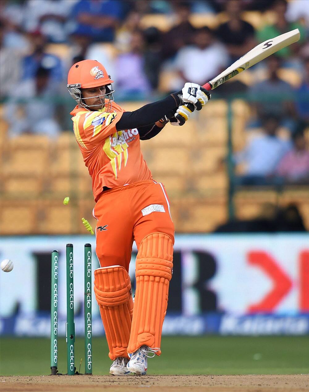 Lahore Lions skipper Muhammad Hafeez is bowled during the Champions League Twenty 20 match against Perth Scorchers at Chinnaswamy Stadium in Bengaluru.