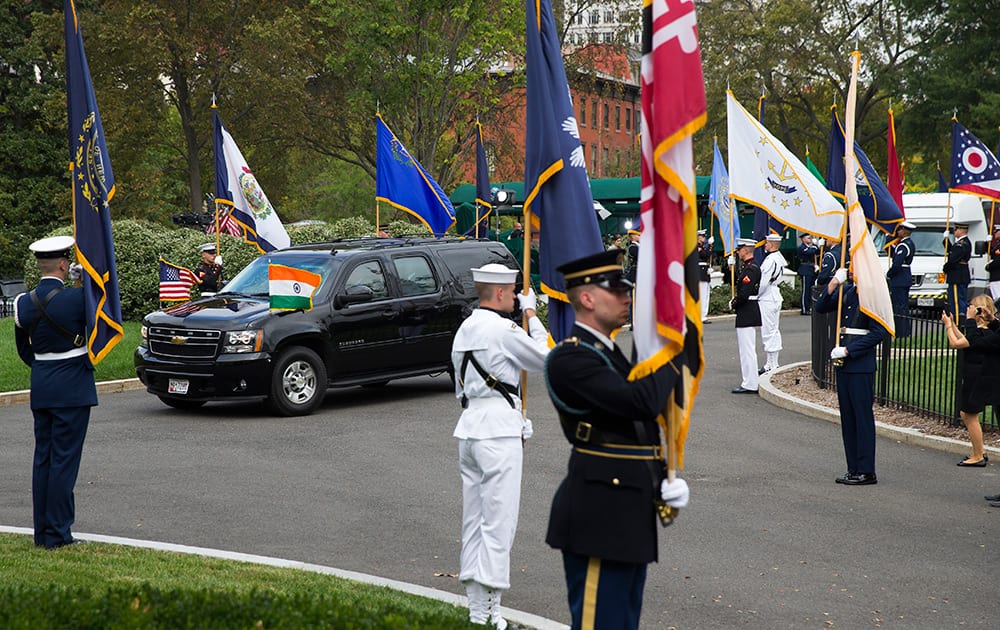 A motorcade carrying Indian Prime Minister Narendra Modi arrives at the White House in Washington for a meeting with President Barack Obama.