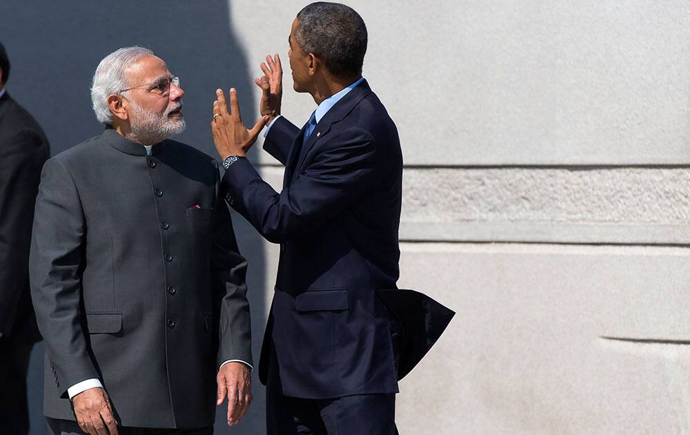 President Barack Obama escorts Indian Prime Minister Narendra Modi at the Martin Luther King Jr. Memorial in Washington