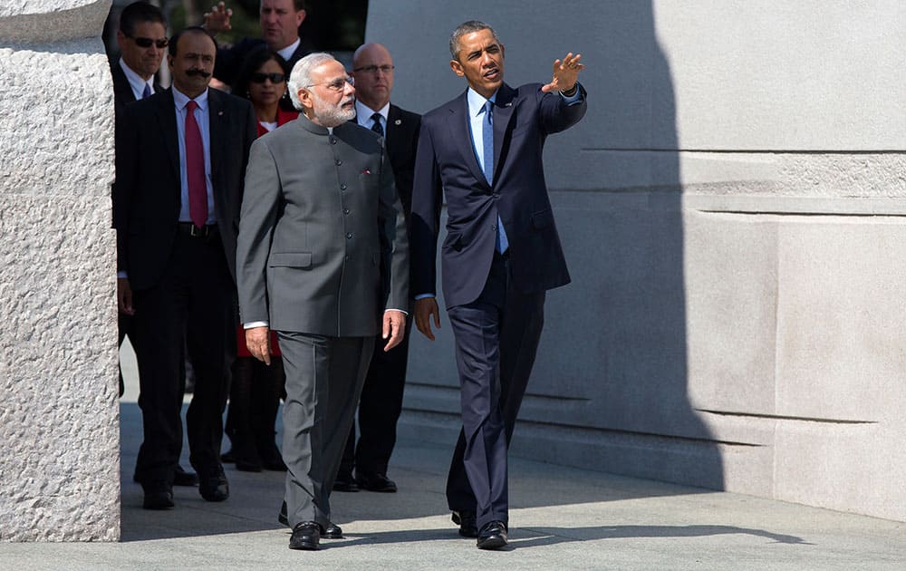 President Barack Obama escorts Indian Prime Minister Narendra Modi at the Martin Luther King Jr. Memorial in Washington.