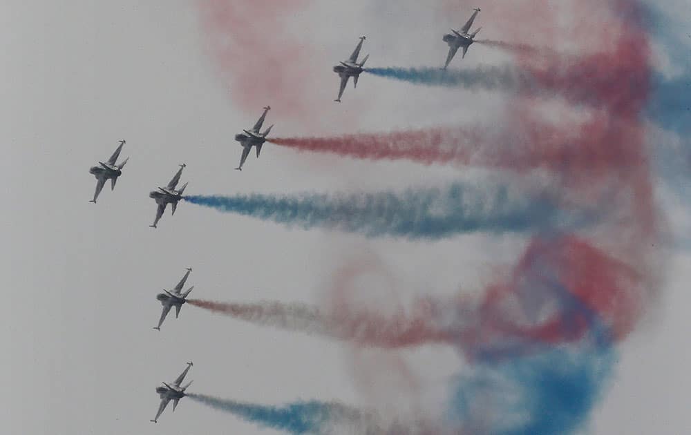 South Korean Air Force's aerobatic team, the Black Eagles, performs during the 66th anniversary of Armed Forces Day at the Gyeryong military headquarters in Gyeryong, South Korea.