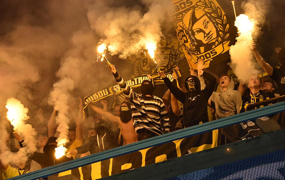 Dortmund's hardcore fans known as 'Ultras' light fireworks during the Group D Champions League match between Anderlecht and Borussia Dortmund at Constant Vanden Stock Stadium in Brussels, Belgium.