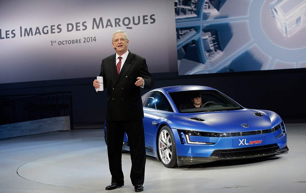 Volkswagen CEO Martin Winterkorn delivers his speech next to a concept car Volkswagen XL Sport at the Volkswagen Group Gala, as part of the Paris Auto Show, in Paris.