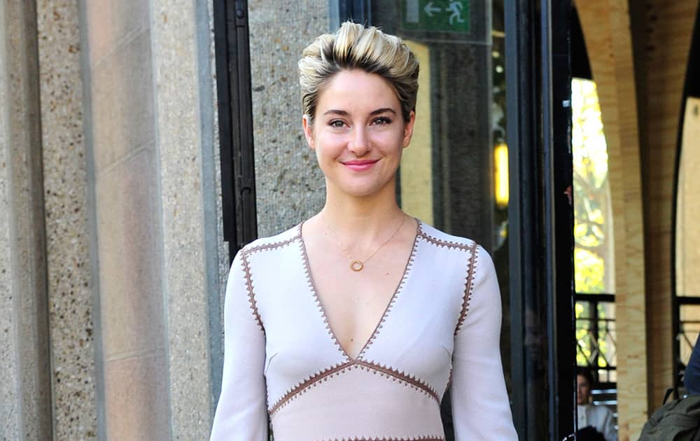 Actress Shailene Woodley poses after Miu Miu's Spring/Summer 2015 ready-to-wear fashion collection presented in Paris.