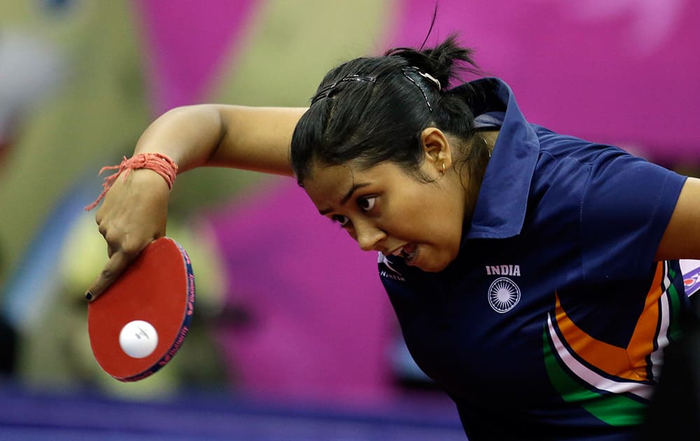 India's Ankita Das returns a ball against Hong Kong's Ng Wing Nam during their women's single table tennis match at the 17th Incheon Asian Games in Suwon, South Korea.