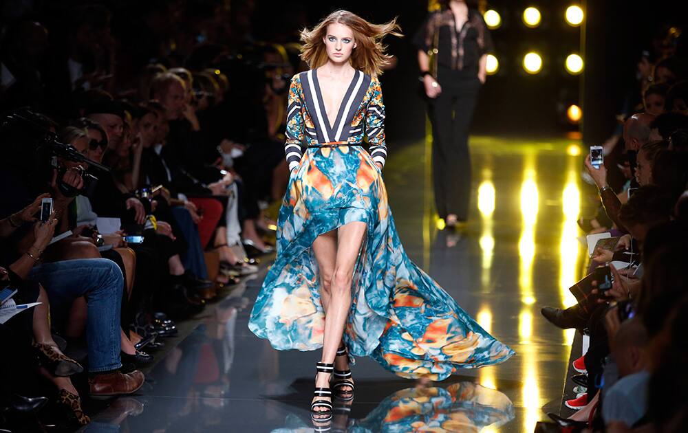 A model wears a creation for Elie Saab's Spring/Summer 2015 ready-to-wear fashion collection presented in Paris.