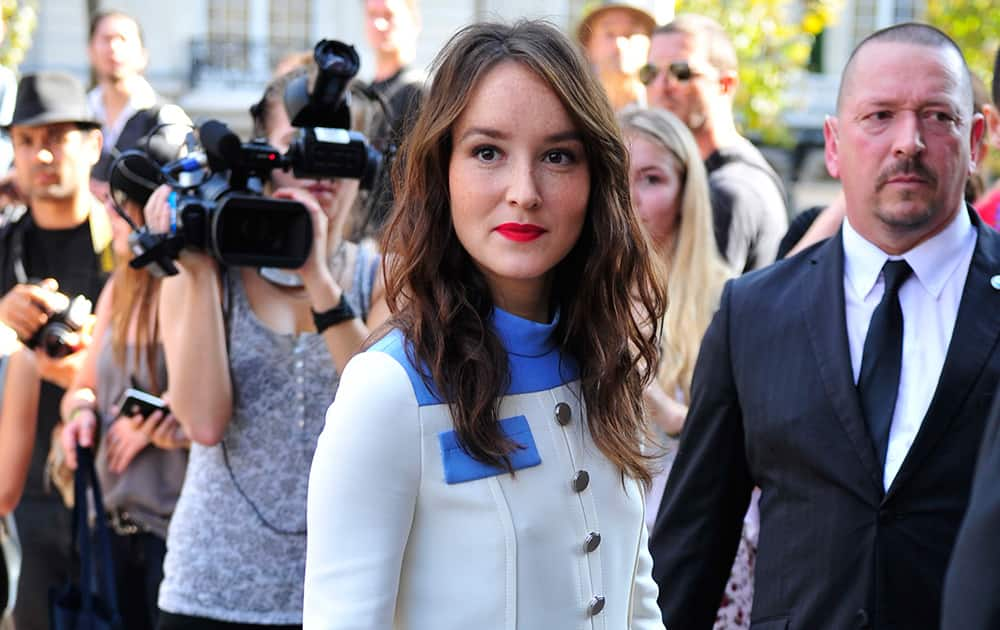 French actress Anais Demoustiers arrives at Miu Miu's Spring/Summer 2015 ready-to-wear fashion collection presented in Paris, France.