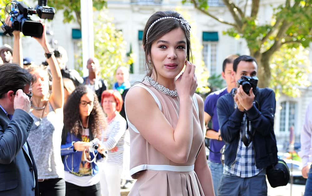 Actress Hailee Steinfeld arrives at Miu Miu's Spring/Summer 2015 ready-to-wear fashion collection presented in Paris, France.