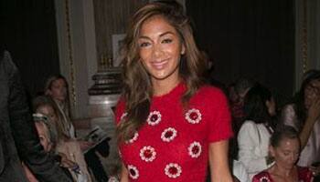 Nicole Scherzinger shows off wacky boots