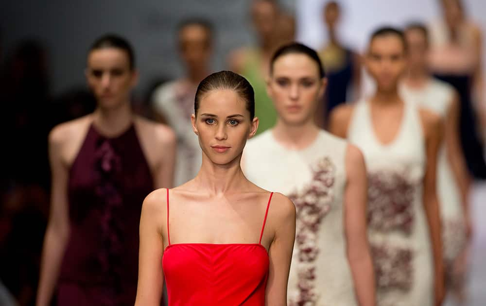 Models wear creations by Mexico designer Macario Jimenez at the Mercedes Benz Fashion Week Mexico in Mexico City.