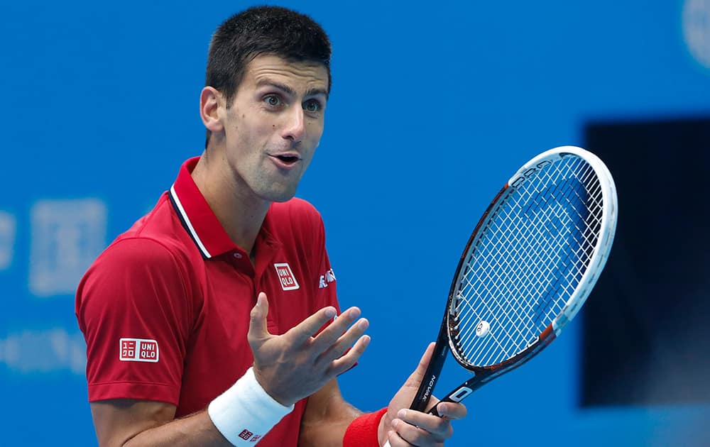 Novak Djokovic of Serbia reacts during his semi final match against Andy Murray of Britain at the China Open tennis tournament at the National Tennis Stadium in Beijing, China.