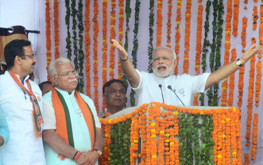 Prime Minister Narendra Modi addresses an election campaign rally in favour of BJP candidates in Karnal.