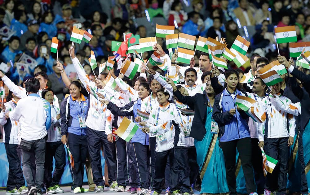 Members of the Indian team march into the stadium during the closing ceremony of the 17th Asian Games in Incheon, South Korea.