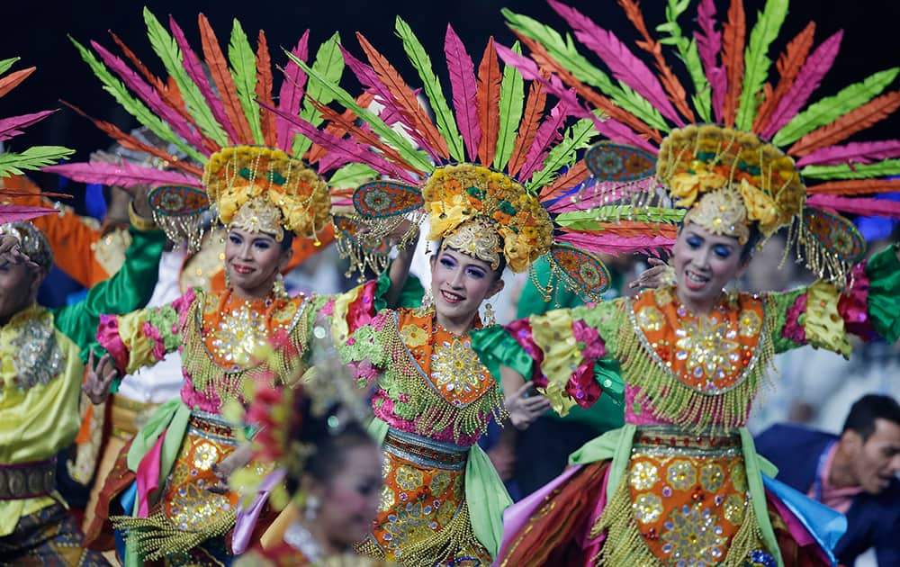 Dancers from the next host country Indonesia perform during the closing ceremony of the 17th Asian Games in Incheon, South Korea.