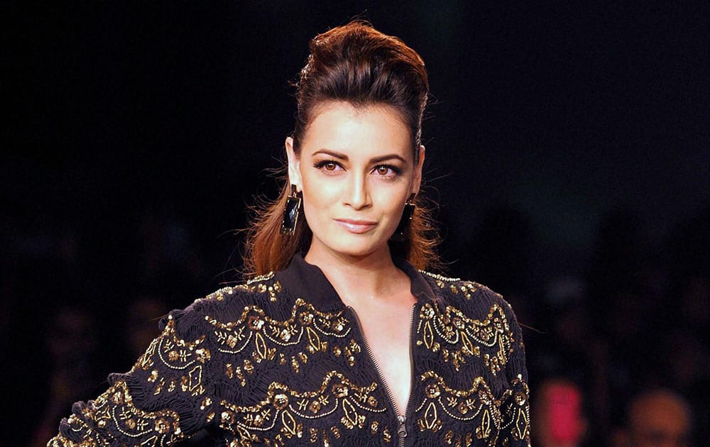 Bollywood actress Dia Mirza walks the ramp during a fashion event in Mumbai.