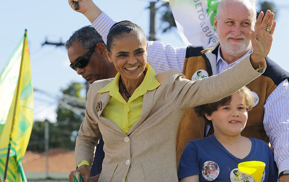 Marina Silva, presidential candidate of the Brazilian Socialist Party, PSB, waves to supporters during a campaign rally in Sao Paulo, Brazil.