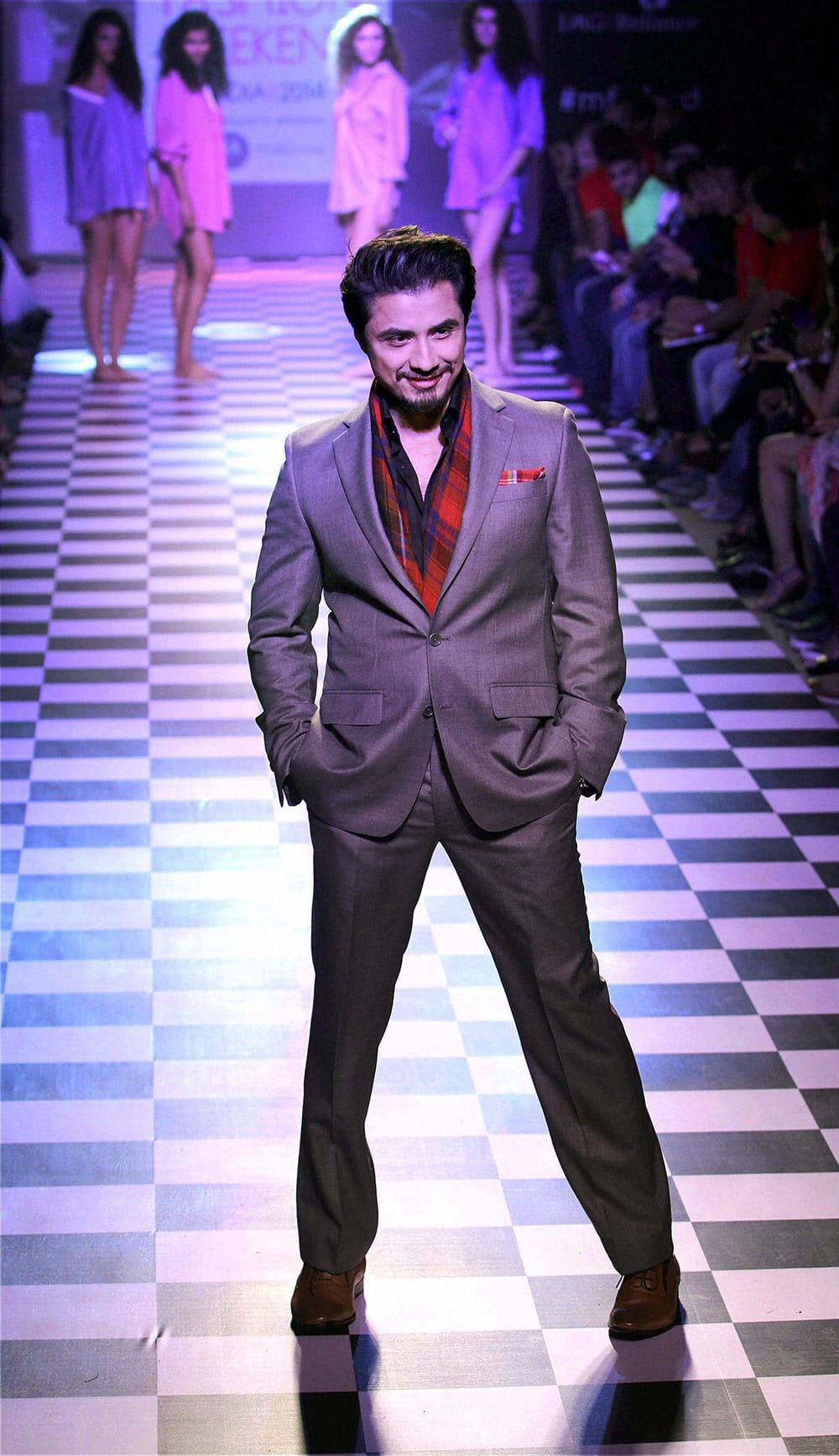 Ali Zafar walks the ramp during a fashion show in Mumbai.